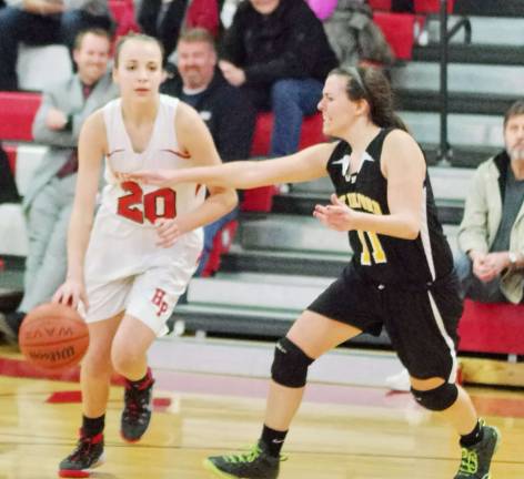 High Point's Margo Peterson is covered by West Milford's Emily Magasic.