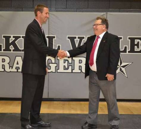Wallkill Valley Interim Superintendent Bob Walker congratulates David Carr, who will take over as Superintendent on Tuesday, Sept. 1.