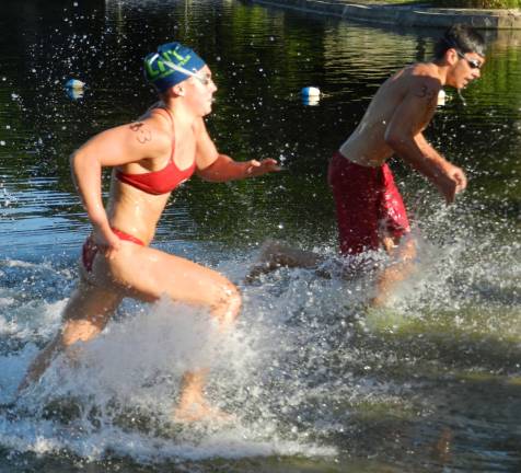 LMCC's Lexi Faria takes 1st place after finishing the 500 yd. Open Water Swim.