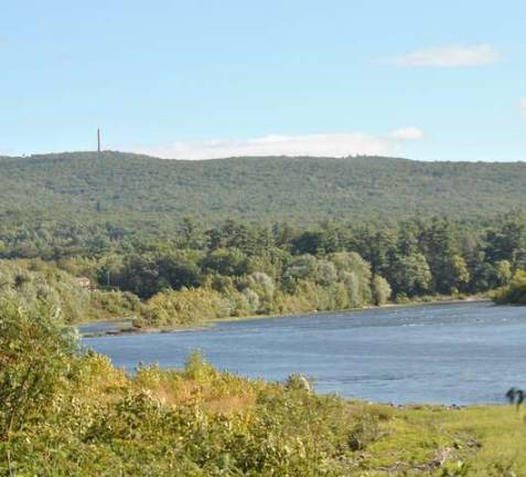 Photo taken from the Riverside Park path next to the river, near the bridge showing where the Whitewater Park would be, with a view toward High Point.&#xa0;(Photo by Anya Tikka)