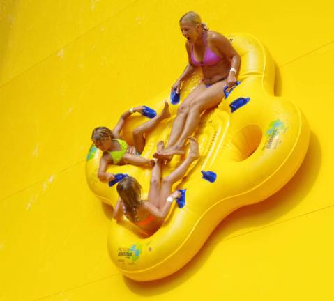 Action Park visitors are shown emerging from the initial freefall of High Anxiety; clearly the most colorful of the park&#xfe;&#xc4;&#xf4;s many rides and attractions.