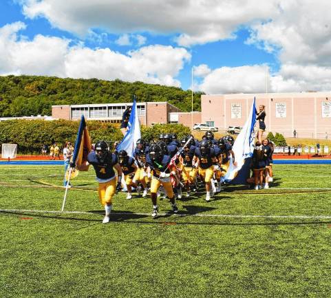 Football roundup: High Point beats Jefferson <b>The Jefferson Township High School football team runs onto its home field for the season opener against High Point on Saturday, Aug. 30. (Photo by Maria Kovic)</b>