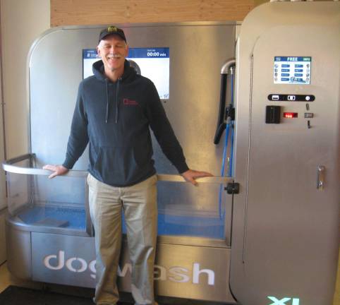 John Kuperus poses with his newly set up, in-house dogwash at Farmside Supplies in Sussex.