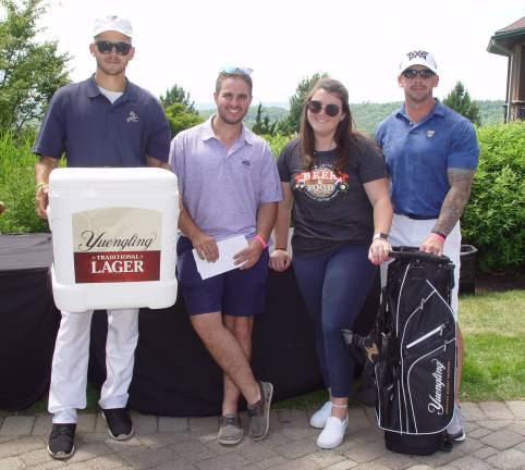 Crystal Springs Brad VanTrevren &amp; Mckenna Maroney congratulate the Brews &amp; Birdies Champs Zachery Finkle &amp; Eric Hollensteir