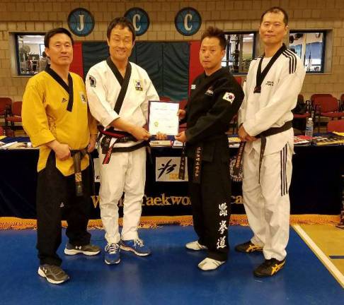 Master Ken received a special award from the Martial Arts Department of Bridgeport University in Connecticut. In acknowledgement of Master Ken's outstanding contribution to the development and promotion of Taekwondo as a World Martial Art, he received this special award. Bridgeport University is the first and only college that has Martial Arts as a major in the United States.