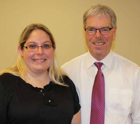 Lakeland Bank President and Chief Executive Officer Tom Shara stands with Leah Ayers who was presented with an Employee of the Quarter Award in September.