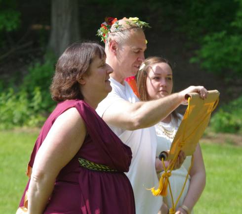 Hamburg hosts Greek Olympics Declaring the start of the games are Hera, portrayed by Pam Dean, Zeus, portrayed by Michael Blochinger, and Aphrodite portrayed by Rachel Windish.