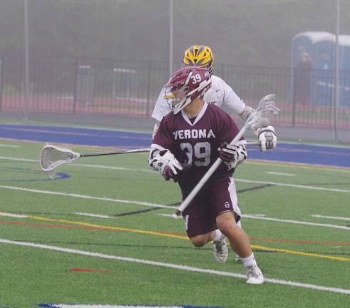 Jefferson tops Verona in lacrosse Verona's Matt DiDia on the move with the ball. DiDia scored one goal.