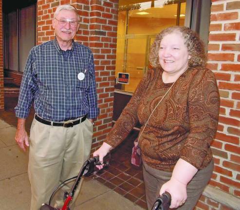 Local citizens protest government shutdown Mike Busche of Sparta, the Chairman of the Sussex County Democrats, with Barbara Kellam Scott of Vernon, picketing Rep. Scott Garrett's office to demand an end to the federal government shutdown