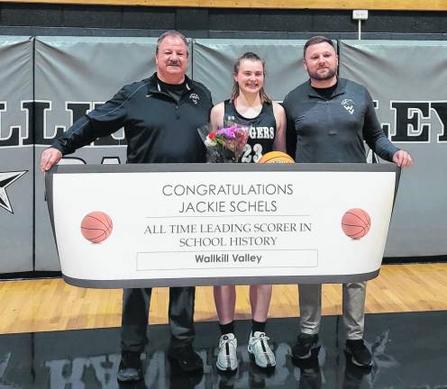 Coach Earl Hornyak, left, celebrates with Jackie Schels.