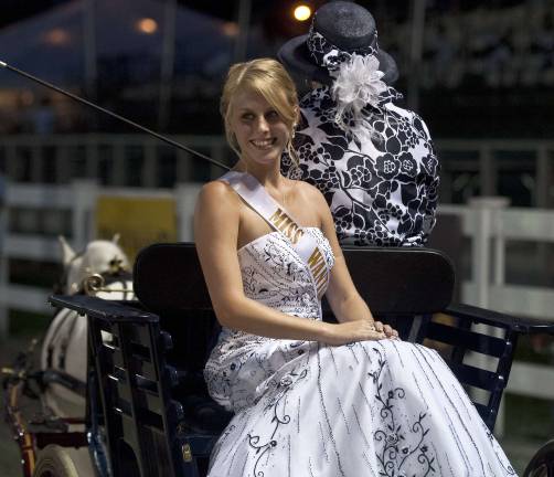 Summertime means County Fair Delaney Sandberg, Miss Wantage, greets the crowd. Photo by Warren Westura