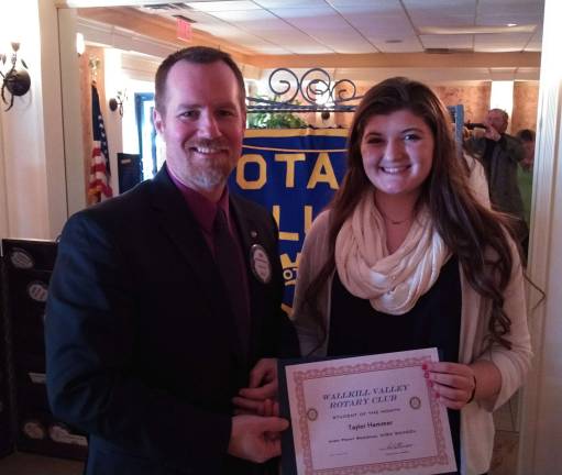 Scholarship winner High Point Regional High School student, Taylor Hemmer (right) is the Wallkill Valley Rotary Club Student of the Month. Presented by Jon Tallamay, club member and High Point Regional HS Principal.