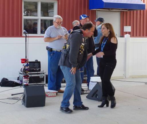 Everyone waited patiently as the winner of the 18th Annual Harley-Davidson motorcycle raffle is selected and announced. The 2016 Heritage Softail Classic is valued at $19,343 and was won by a person with the 201 area code telephone number. The winner did not answer when they attempted to call.