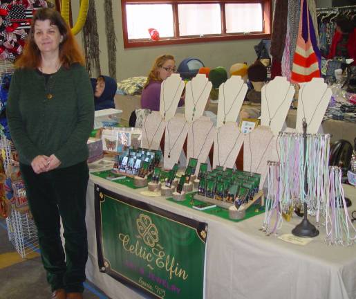 Jean Karpowich the owner of Celtic Elfin Art &amp; Jewelry shows off her line of products