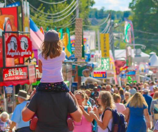 On dad's shoulders at the State Fair in Augusta on Sunday, Aug. 11, 2019.