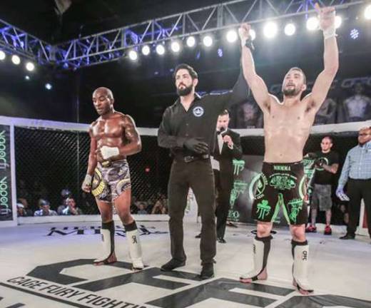 Jim Fitzpatrick wins third straight Jim Fitzpatrick (right) has his hand raised following his unanimous decision victory over Bobby Malcolm (left) at CFFC 65.