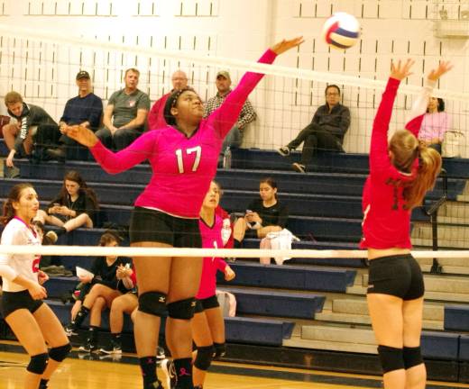 Jefferson's Stephanie Nwankwo (17) strikes the ball. Nwankwo accomplished 8 kills and 2 blocks.