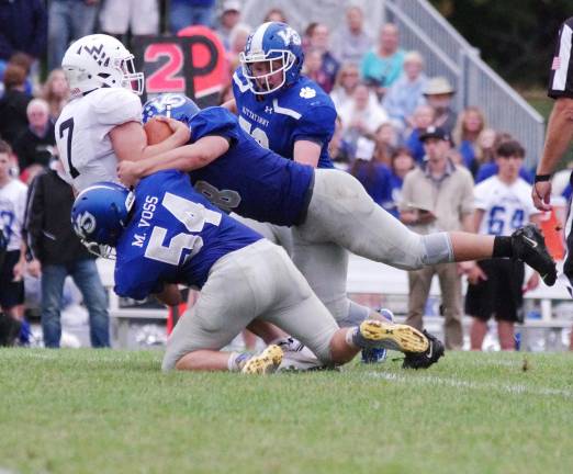 Kittatinny defensive linemen sack Wallkill Valley quarterback Alex Mastroianni in the second half. Mastroianni passed for 119 yards. Mastroianni ran for a touchdown and threw one touchdown pass.