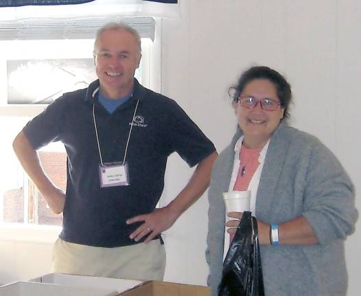 Vendors Bob Batic and Lisa Yodice are ready to greet visitors and assist them with gorgeous treasures (Photo by Janet Redyke)