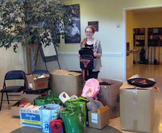 Photo provided Girl Scout Troop #897 member Andi Kidd conducted a school supply drive on behalf of Project Self-Sufficiency in order to achieve her Silver Award.