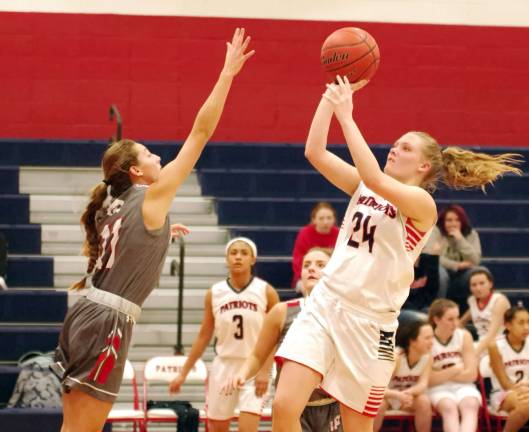 Lenape Valley's Madison Tredway raises the ball towards the hoop during a shot as High Point's Tyra Wingle attempts to block in the fourth quarter. Tredway scored 5 points and grabbed 2 rebounds.