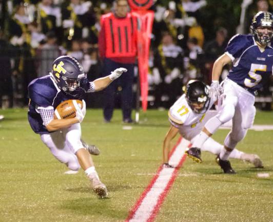 Jefferson beats West Milford for first win Jefferson kick returner Matthew Cappello carries the ball during the first quarter.