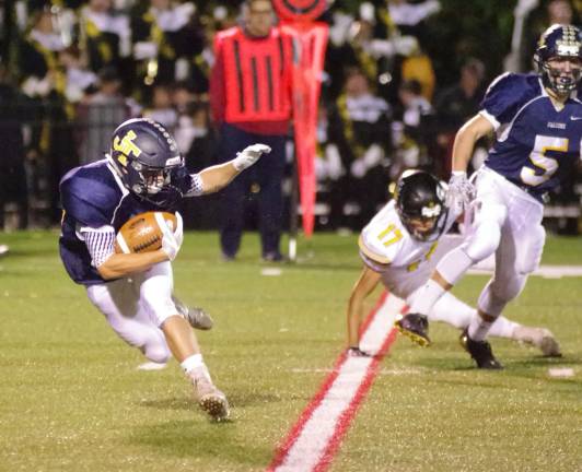 Jefferson kick returner Matthew Cappello carries the ball during the first quarter.