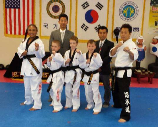 nEW BLACK BELTS Four students at Master Ken's recently earned their black belts after passing eight weeks of special training, egg tradition for 10 days and fasting for three days. Master Ken's Black Belt students received a certificate from Taekwondo Headquarters in Korea. Pictured, from left, are Cassidy C. and Nathaniel C., both of Wantage, Brian L. of Hamburg and Alexander G. of Wantage.