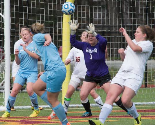 Hamburg native following dreams Holly Lutz is shown as a goalkeeper on the Norwich women's soccer team.