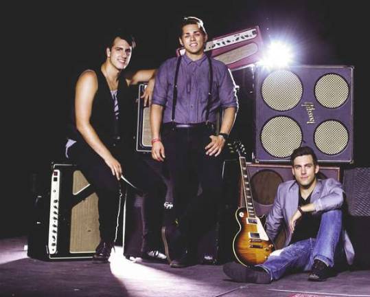 Reverse Order brings Reverse the Trend to Hamburg school From left, Cruise Russo, Andrew Katsock, and John Russo are shown.