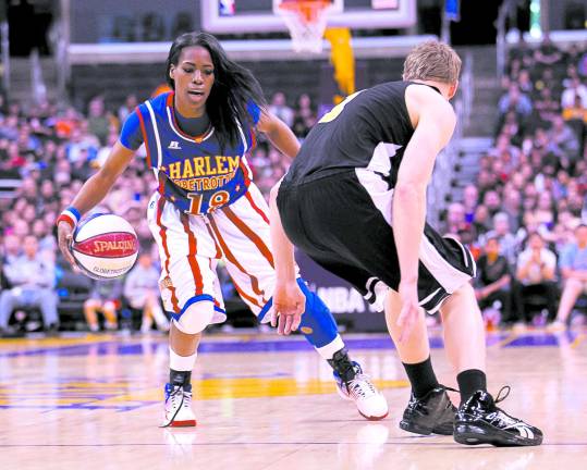 First female Harlem Globetrotter in 20 years makes team TNT Maddox