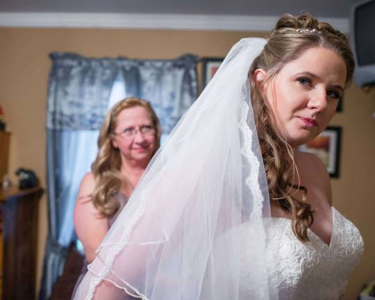 Shannon Knowlton and her mom Terri Burdett of Sparta &quot;Getting ready for my wedding day with my mother. Oct. 19, 2013.&quot;