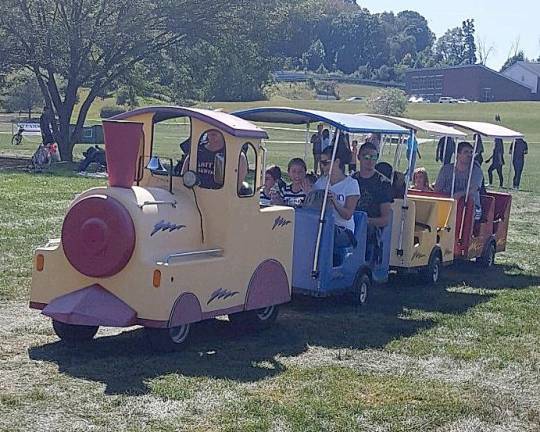 Families enjoy a ride on the train