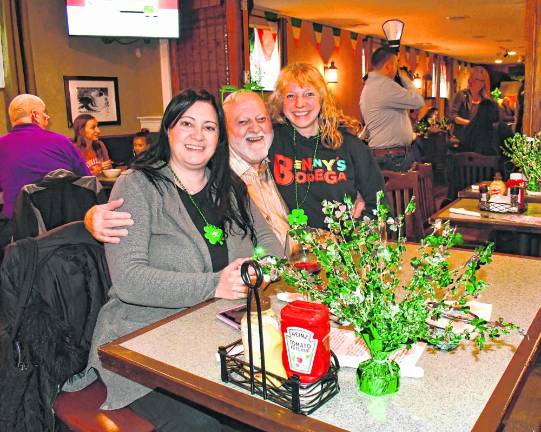 Nicole Albert, Aldo Putignano and Rocky Wilson enjoy the party at the Irish Cottage Inn in Franklin.