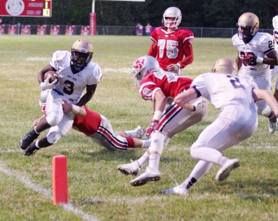 Pope John running back Berrell Neal was stopped short of the goal line on this play but rushed for 165 yards and scored 3 touchdowns.