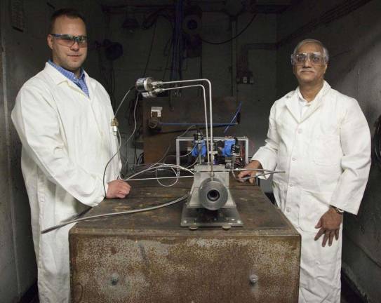 Wallkill Valley Regional High School graduate Greg Young, left, is shown with Vasant Joshi.