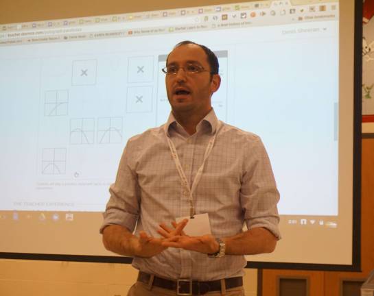 Denis Sheeran teaches educators how to use technology in teaching.