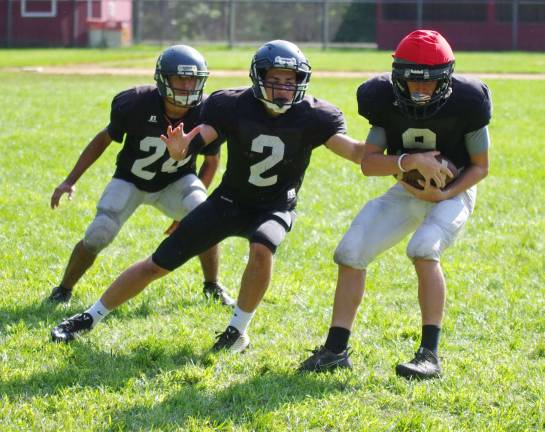Three Wallkill Valley Rangers on the move during practice.