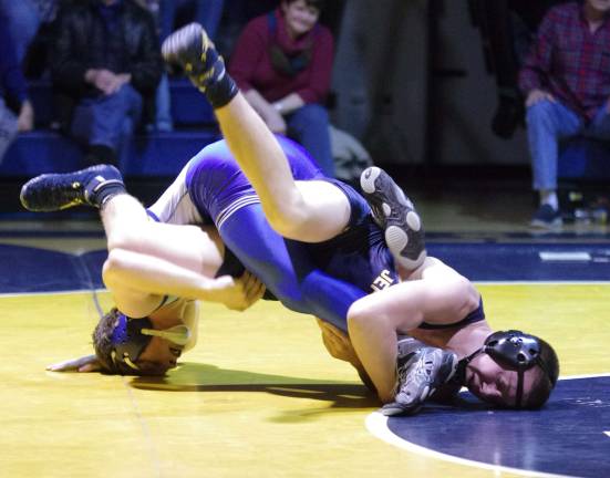 From left Kittatinny's Dylan Minter is intangled with Jefferson's Shane Connolly in the 152-pound weight class. Minter won the match 8-3.