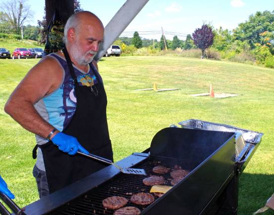 Stanhope veteran Frank Arminio worked as grill master for the Third Annual Sussex County Veteran&#xfe;&#xc4;&#xf4;s Picnic held at Pvt. Charles Auberger American Legion Post Number 213 in Wantage.