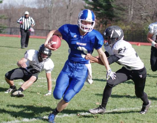 Kittatinny's quarterback Nicholas Geimer advances the ball on a keeper. Geimer passed for 194 yards resulting in two touchdowns.