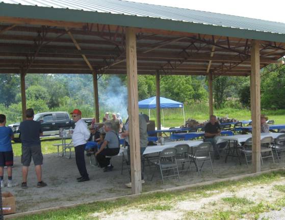 A donated barbeque treated veterans after a day of fishing.