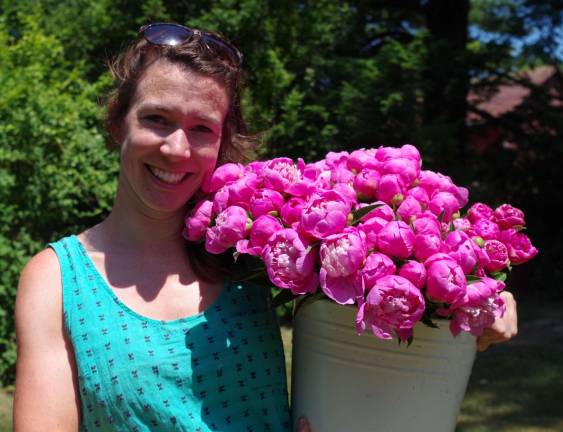 Meadowburn Farm draws photographersopens for visitors Event coordinator and garden manager Quill Teal-Sullivan had just returned from the greenhouse with a bouquet of freshly cut peonies.