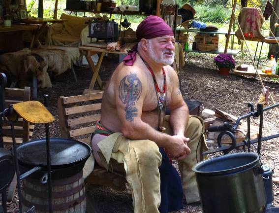Re-enactor &quot;Buffalo Man&quot; Frank Diraimondo of Oakland spent much of the week firing his musket as well as relaxing by a campfire. This is the Garden State Black Powder Association&#xfe;&#xc4;&#xf4;s 20th anniversary as an organization.