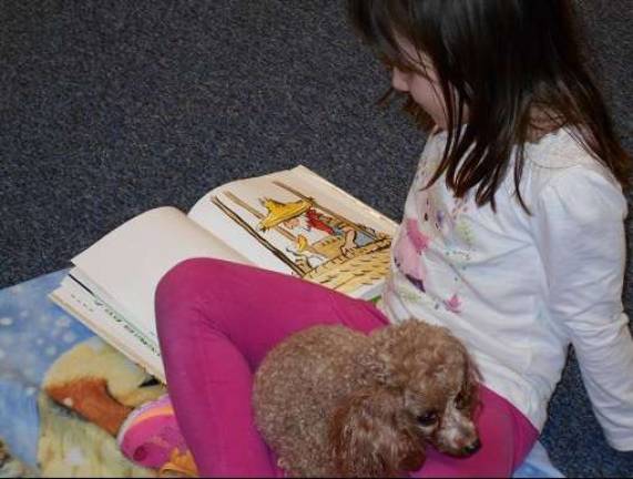 Story time for Chloe and friend.