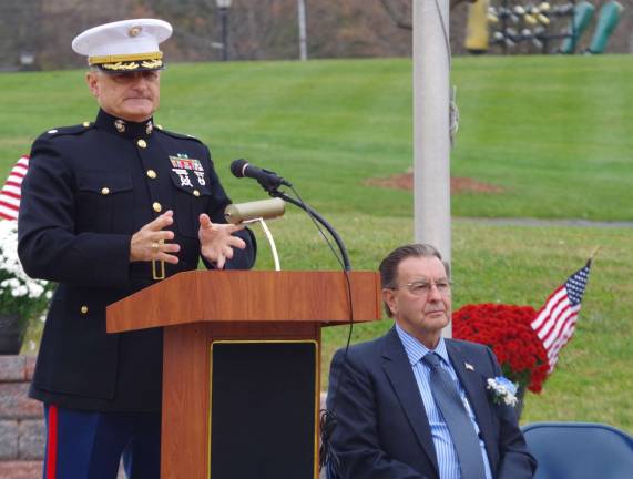 2015: The year in pictures PHOTO BY CHRIS WYMAN Retired U.S. Marine Corps Lt. Colonel Daniel A. Colfax, Esq. addresses the audience. Colfax of Sparta is the townshipþÄôs Public Defender, a recipient of the 2012 New Jersey State Bar Association Professionalism Award" and a past President of the Sussex County Bar Association. Mayor Carl Miller sits to his side on Nov. 7.