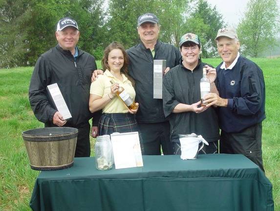 Golffest kicks off with tournaments Photo courtesy John Whiting Jack Corcoran, Mark Lomauro, Buffy and John Whiting sample the product at a Mcallan Scotch tasting station on the golf course