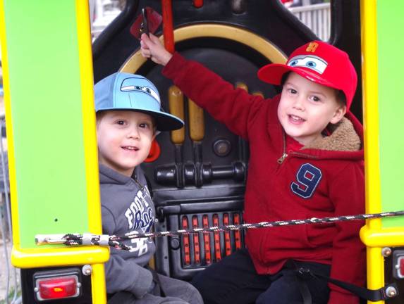 Twin brothers Jason and Christian Gambon, 3-1/2, of Vernon manned the train at Heaven Hill Farm and kept the bell ringing as they circled around on the tracks.
