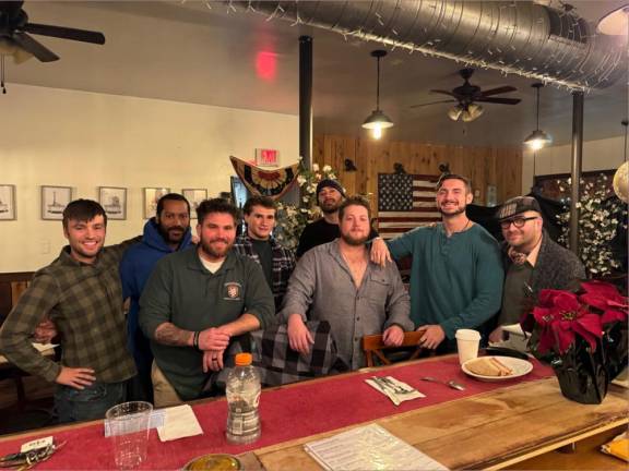 Talking to filmmaker Kevan Ali Matt Michaud, left, producer of ‘Emerald Ties,’ and associate producer Nicholas Buckley, second from left, rehearse the cast for a week before filming begins. (Photo by Kevan Ali)