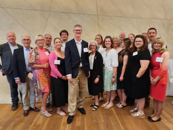 Participants in the Jewish Foundation for the Righteous’s 2023 European Study Program pose with Daniel Lawton, center, deputy chief of mission at the U.S. Embassy in Poland. (Photo provided)